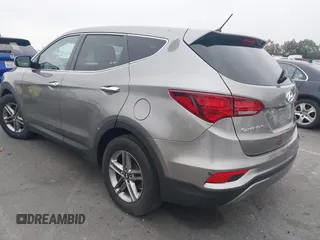 2018 Hyundai Santa Fe 2.4L with VIN 5XYZT3LB7JG569517, listed as a IAAI auction lot 42141100 with 57,854 mi miles and . Bid and sale history available at DreamBid. Image 3.