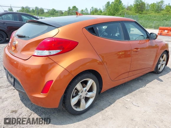 2012 Hyundai Veloster w/Gray Int с VIN KMHTC6AD0CU043402, выставлен на аукционе IAAI как лот 42406321 с пробегом 116 734 миль миль и . История ставок и продаж доступна на DreamBid. Изображение 4.