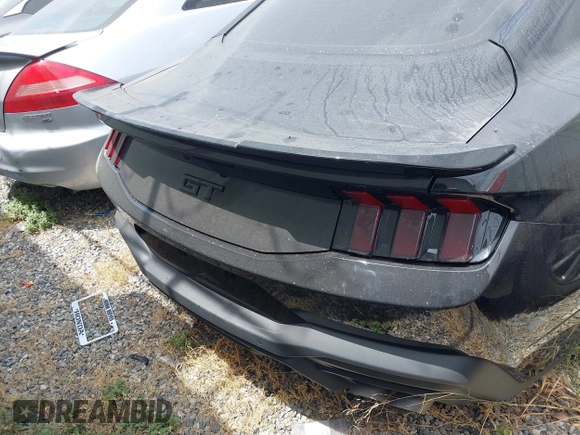 2024 Ford Mustang GT z VIN 1FA6P8CF5R5420461, wystawiony jako IAAI lot #42515797 z przebiegiem 28 636 mil mil oraz . Historia ofert i sprzedaży dostępna na DreamBid. Obrazek 17.