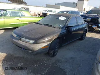 1996 Saturn SL with VIN 1G8ZF5289TZ265189, listed as a IAAI auction lot 41618552 with 264,742 mi miles. Bid and sale history available at carsss.com. Image 2.