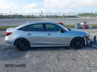 2025 Honda Civic Sport z VIN 2HGFE2F57SH519010, wystawiony jako IAAI lot #41934874 z przebiegiem 7999 mil mil oraz . Historia ofert i sprzedaży dostępna na DreamBid. Obrazek 13.