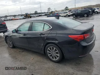 2019 Acura TLX with VIN 19UUB1F31KA002597, listed as a Copart auction lot 86573334 with 86,033 mi miles and Salvage Title. Bid and sale history available at carsss.com. Image 2.