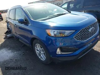 2024 Ford Edge SEL z VIN 2FMPK4J96RBA12822, wystawiony jako IAAI lot #41940628 z przebiegiem 8981 mil mil oraz . Historia ofert i sprzedaży dostępna na DreamBid. Obrazek 1.