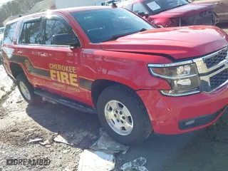 2019 Chevrolet Tahoe Commercial with VIN 1GNSKFEC7KR388178, listed as a IAAI auction lot 41299288 with 82,851 mi miles. Bid and sale history available at carsss.com. Image 1.