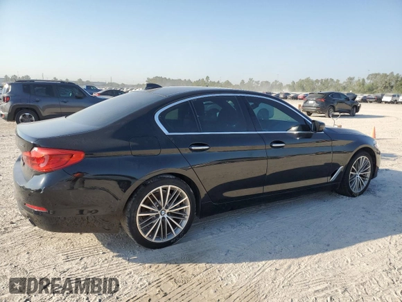 2018 BMW 5 Series 530i with VIN WBAJA5C54JG899845, listed as a Copart auction lot 76386124 with 57,379 mi miles and Salvage Title. Bid and sale history available at DreamBid. Image 3.