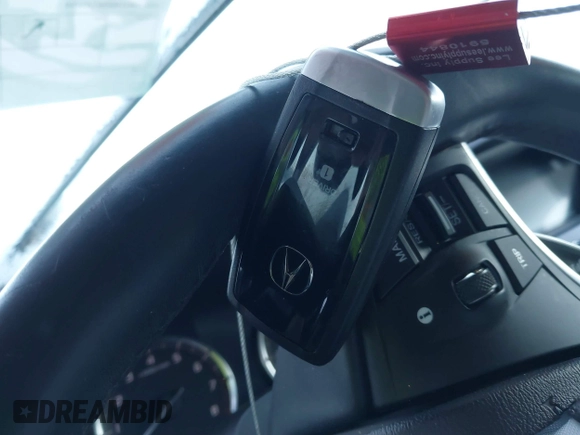 2020 Acura MDX Technology z VIN 5J8YD4H59LL016510, wystawiony jako IAAI lot #41216544 z przebiegiem Nie podano mil oraz . Historia ofert i sprzedaży dostępna na DreamBid. Obrazek 11.