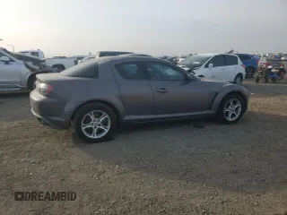 2006 Mazda RX-8 with VIN JM1FE173X60205870, listed as a Copart auction lot 87131664 with 82,990 mi miles and Salvage Title. Bid and sale history available at carsss.com. Image 3.