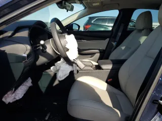 2024 Mazda 3 S Preferred z VIN 3MZBPACM2RM436221, wystawiony jako Copart lot #56953885 z przebiegiem 7 211 mil mil oraz Szkoda całkowita • Salvage title. Historia ofert i sprzedaży dostępna na DreamBid. Obrazek 7.