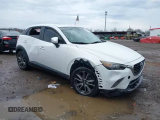 2017 Mazda CX-3 Touring with VIN JM1DKFC77H0172867, listed as a IAAI auction lot 41901655 with 144,778 mi miles. Bid and sale history available at carsss.com. Image 1.