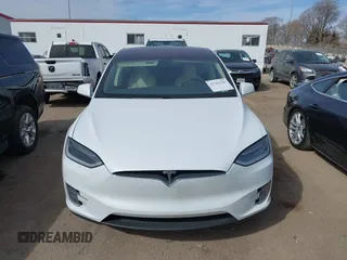 2018 Tesla Model X 75D with VIN 5YJXCBE27JF121834, listed as a IAAI auction lot 41769246 with 90,814 mi miles and . Bid and sale history available at carsss.com. Image 12.