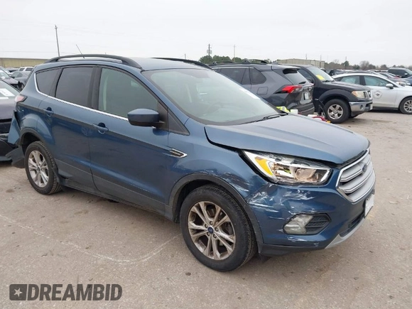2018 Ford Escape SE with VIN 1FMCU0GD0JUC58115, listed as a IAAI auction lot 41578309 with 76,162 mi miles. Bid and sale history available at carsss.com. Image 1.
