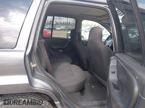 2004 Jeep Grand Cherokee Laredo z VIN 1J4GW48SX4C213322, wystawiony jako IAAI lot #41969362 z przebiegiem 273 876 mil mil oraz . Historia ofert i sprzedaży dostępna na DreamBid. Obrazek 8.