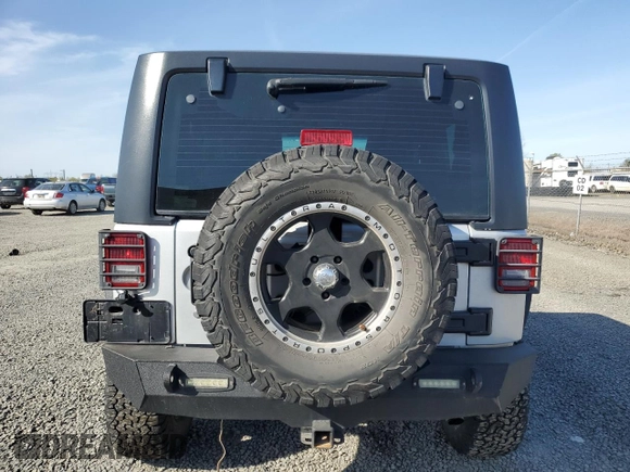 2012 Jeep Wrangler Sport z VIN 1C4AJWAG3CL151885, wystawiony jako Copart lot #51682175 z przebiegiem 111 544 mil mil oraz Szkoda całkowita • Salvage title. Historia ofert i sprzedaży dostępna na DreamBid. Obrazek 6.