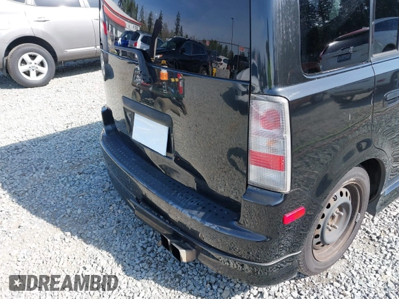2005 Scion xB with VIN JTLKT334454021261, listed as a IAAI auction lot 42124927 with 221,043 mi miles. Bid and sale history available at carsss.com. Image 6.