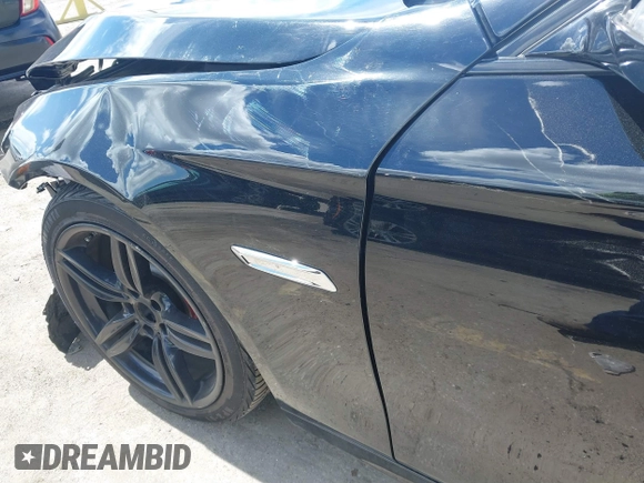 2014 BMW 5 Series 535i with VIN WBA5B1C58ED481934, listed as a IAAI auction lot 41793504 with 190,773 mi miles and . Bid and sale history available at DreamBid. Image 21.