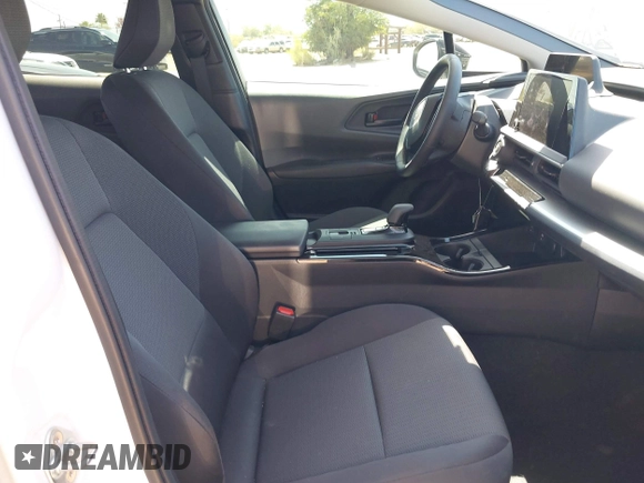 2024 Toyota Prius LE with VIN JTDACAAU5R3046244, listed as a IAAI auction lot 42464523 with 13,590 mi miles and . Bid and sale history available at DreamBid. Image 5.