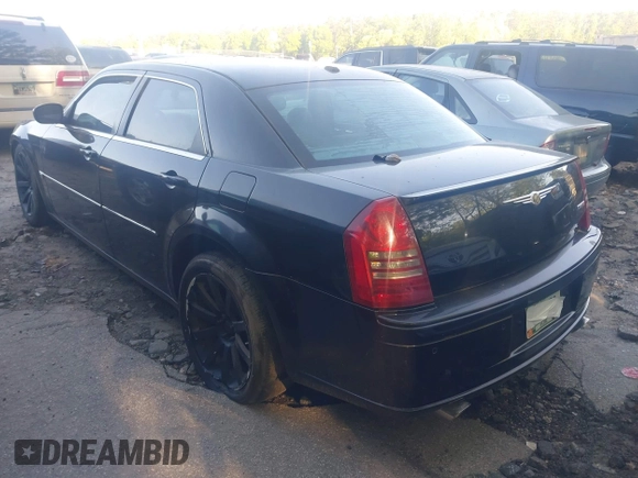 2006 Chrysler 300 C SRT8 with VIN 2C3LA73W66H249303, listed as a IAAI auction lot 42009645 with 137,242 mi miles. Bid and sale history available at carsss.com. Image 3.