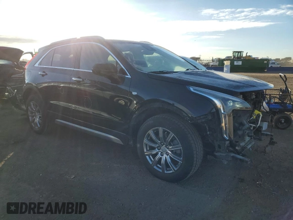 2020 Cadillac XT4 AWD Premium Luxury with VIN 1GYFZDR49LF032597, listed as a Copart auction lot 88595595 with 82,324 mi miles and Salvage title. Bid and sale history available at DreamBid. Image 4.