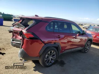 2024 Toyota RAV4 Hybrid XLE Premium with VIN JTMB6RFVXRD120389, listed as a Copart auction lot 47596985 with 16,956 mi miles and Salvage Title. Bid and sale history available at DreamBid. Image 3.