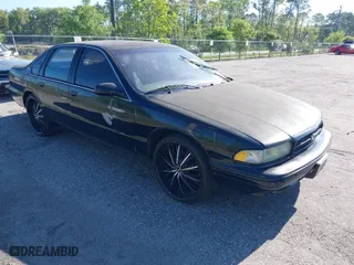 1996 Chevrolet Caprice Classic 1SA Special Value Pkg with VIN 1G1BL52PXTR141223, listed as a IAAI auction lot 41693524 with 1 mi miles. Bid and sale history available at carsss.com. Image 1.
