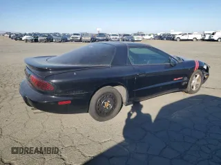 1999 Pontiac Firebird Firebird z VIN 2G2FS22K6X2208489, wystawiony jako Copart lot #79930994 z przebiegiem 181 964 mil mil oraz Czysty tytuł • Clean title. Historia ofert i sprzedaży dostępna na DreamBid. Obrazek 3.