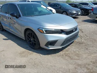 2022 Honda Civic Sport z VIN 2HGFE2F54NH566208, wystawiony jako IAAI lot #41974270 z przebiegiem 36 988 mil mil oraz . Historia ofert i sprzedaży dostępna na DreamBid. Obrazek 1.