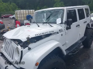 2016 Jeep Wrangler Unlimited Rubicon Hard Rock with VIN 1C4BJWFG3GL228449, listed as a IAAI auction lot 42158318 with Not provided miles and . Bid and sale history available at DreamBid. Image 6.