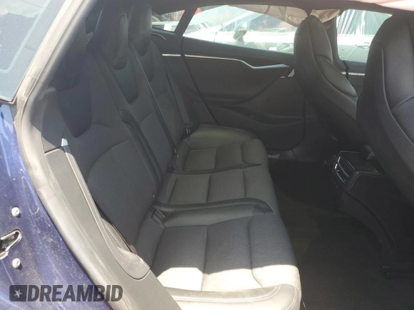 2018 Tesla Model S 75D with VIN 5YJSA1E25JF249743, listed as a Copart auction lot 59636235 with 101,275 mi miles and Salvage title. Bid and sale history available at DreamBid. Image 10.