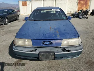 1990 Ford Taurus z VIN 1FACP5747LA124012, wystawiony jako Copart lot #85290054 z przebiegiem 118 017 mil mil oraz Czysty tytuł • Clean title. Historia ofert i sprzedaży dostępna na DreamBid. Obrazek 5.