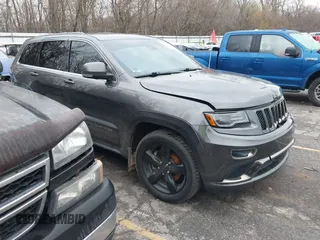 2015 Jeep Grand Cherokee Overland with VIN 1C4RJFCM6FC195180, listed as a IAAI auction lot 40758296 with 77,428 mi miles and . Bid and sale history available at DreamBid. Image 1.