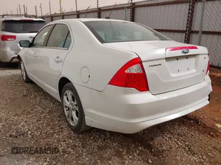 2012 Ford Fusion SE z VIN 3FAHP0HA3CR285217, wystawiony jako IAAI lot #41792353 z przebiegiem 190 916 mil mil oraz . Historia ofert i sprzedaży dostępna na DreamBid. Obrazek 3.