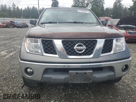 2006 Nissan Frontier SE with VIN 1N6AD06W76C415051, listed as a Copart auction lot 57486555 with 162,012 mi miles and Salvage title. Bid and sale history available at DreamBid. Image 5.