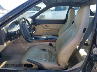 1986 Porsche 944 z VIN WP0AA0942GN460359, wystawiony jako Copart lot #56519965 z przebiegiem 95 915 mil mil oraz Szkoda całkowita • Salvage title. Historia ofert i sprzedaży dostępna na DreamBid. Obrazek 7.