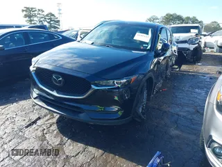 2021 Mazda CX-5 Touring with VIN JM3KFBCM9M0483082, listed as a IAAI auction lot 41305127 with 42,926 mi miles. Bid and sale history available at carsss.com. Image 17.