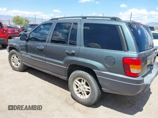 2003 Jeep Grand Cherokee Laredo with VIN 1J4GW48S53C571247, listed as a IAAI auction lot 42416174 with 175,328 mi miles and . Bid and sale history available at DreamBid. Image 3.