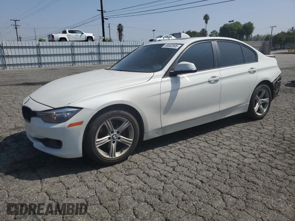 2015 BMW 3 Series 328i with VIN WBA3C1C51FP852887, listed as a Copart auction lot 58882695 with 146,823 mi miles and Salvage title. Bid and sale history available at DreamBid. Image 1.