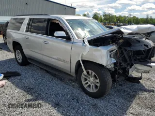 2020 Chevrolet Suburban LT with VIN 1GNSCHKC7LR151169, listed as a Copart auction lot 55684565 with 87,987 mi miles and Salvage title. Bid and sale history available at DreamBid. Image 1.