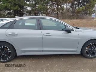 2024 Kia K5 GT-Line z VIN 5XXG64J23RG253362, wystawiony jako IAAI lot #41848600 z przebiegiem 17 481 mil mil oraz . Historia ofert i sprzedaży dostępna na DreamBid. Obrazek 14.