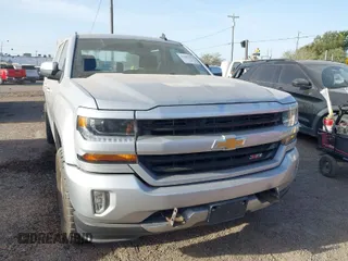 2017 Chevrolet Silverado 1500 LT with VIN 3GCUKREC2HG392487, listed as a IAAI auction lot 41807394 with 113,041 mi miles and . Bid and sale history available at DreamBid. Image 1.