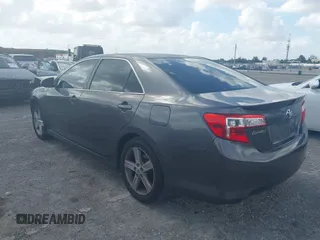 2012 Toyota Camry L with VIN 4T1BF1FK1CU165165, listed as a IAAI auction lot 41957566 with 127,048 mi miles. Bid and sale history available at carsss.com. Image 3.
