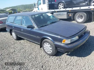1991 Toyota Camry z VIN JT2SV21W3M0389983, wystawiony jako IAAI lot #42448678 z przebiegiem 312 034 mil mil oraz . Historia ofert i sprzedaży dostępna na DreamBid. Obrazek 1.