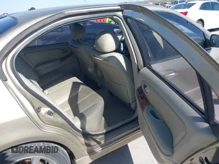 2002 Infiniti I35 Luxury with VIN JNKDA31A12T029546, listed as a IAAI auction lot 41853216 with 89,911 mi miles. Bid and sale history available at carsss.com. Image 8.