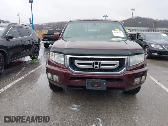 2009 Honda Ridgeline RTL with VIN 5FPYK16529B100032, listed as a IAAI auction lot 41206781 with 130,694 mi miles and . Bid and sale history available at DreamBid. Image 12.