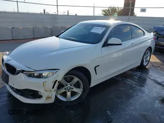 2014 BMW 4 Series 428i with VIN WBA3N7C50EF718812, listed as a IAAI auction lot 41349128 with 67,581 mi miles and . Bid and sale history available at carsss.com. Image 2.