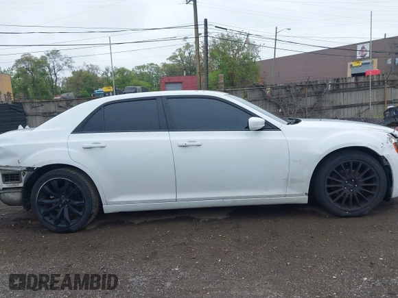 2014 Chrysler 300 S with VIN 2C3CCABG9EH355602, listed as a IAAI auction lot 42244756 with 165,816 mi miles and . Bid and sale history available at DreamBid. Image 13.