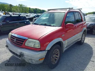 2005 Suzuki Grand Vitara LX z VIN JS3TD62VX54201211, wystawiony jako IAAI lot #42220221 z przebiegiem 242 165 mil mil oraz . Historia ofert i sprzedaży dostępna na DreamBid. Obrazek 6.
