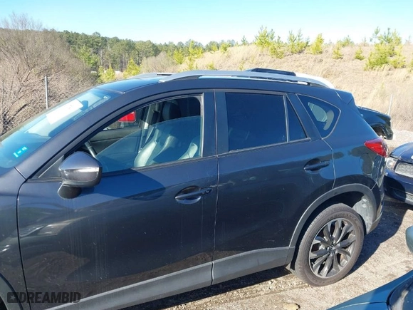 2016 Mazda CX-5 Grand Touring with VIN JM3KE4DY5G0843355, listed as a IAAI auction lot 41775499 with NaN miles. Bid and sale history available at carsss.com. Image 14.