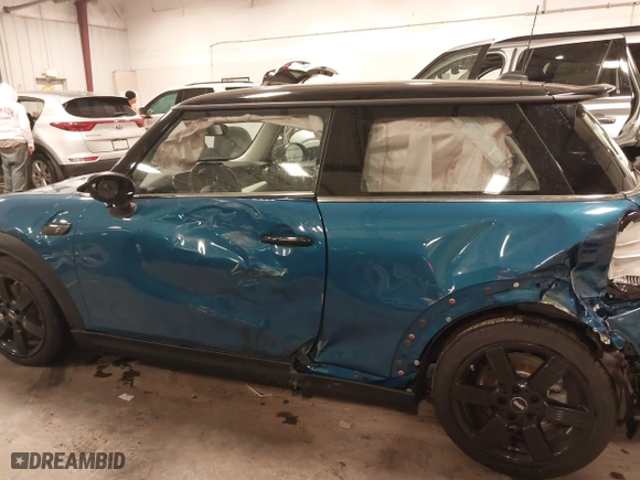 2024 MINI Hardtop 2 Door Cooper S with VIN WMW53DH08R2U74513, listed as a IAAI auction lot 40993803 with 7,817 mi miles. Bid and sale history available at carsss.com. Image 15.