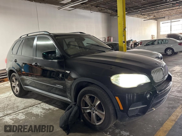 2011 BMW X5 35d with VIN 5UXZW0C55BL661651, listed as a Copart auction lot 61866905 with 162,927 mi miles and Clean title. Bid and sale history available at DreamBid. Image 1.