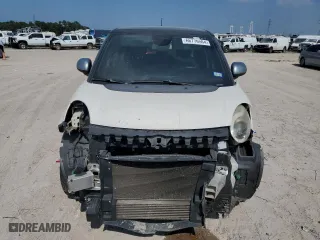 2014 FIAT 500L Lounge with VIN ZFBCFACH4EZ022320, listed as a Copart auction lot 66776564 with 123,590 mi miles and Salvage Title. Bid and sale history available at carsss.com. Image 5.